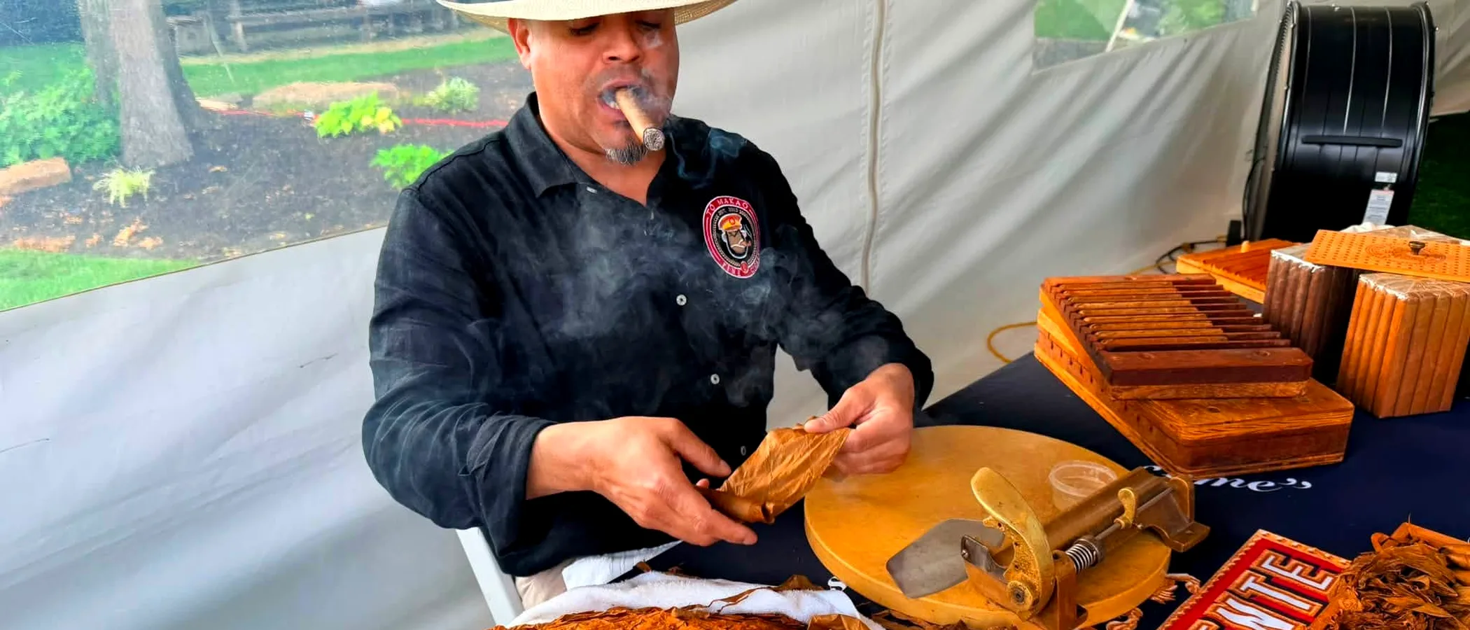 Franklin Pichardo rolling cigars at a corporate activation